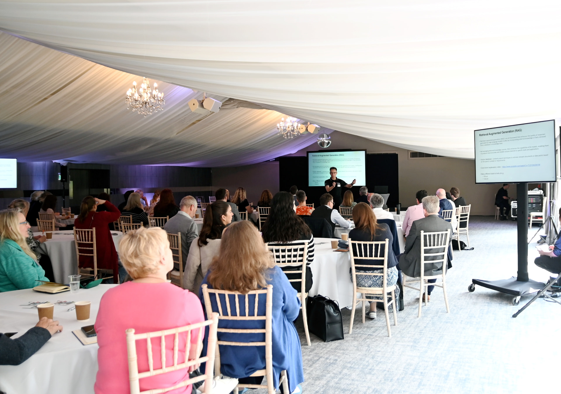 Partnership event: a presentation to a seated audience